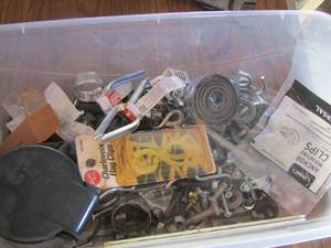lot 49 image: Misc. screws- hooks- clamps- plus