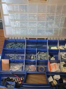 lot 122 image: Tool caddy with drill bits- screws- bolts- washers plus