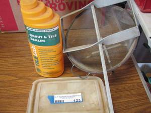 lot 123 image: Grout seater- paint mixer- strainer