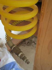 lot 143 image: yellow air hose