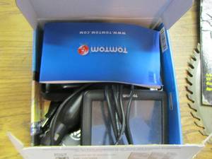 lot 204 image: TOM TOM 335-5e XL navigation system