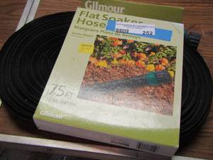 lot 252 image: 75ft flat soaker hose in original packing