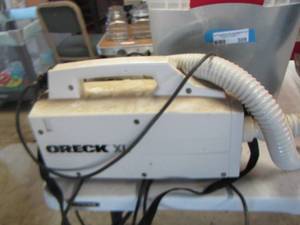 lot 309 image: Oreck Xl vacuum - various other pieces and parts