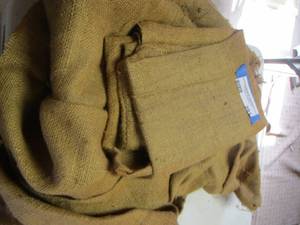 lot 391 image: Burlap sacks and one burlap piece