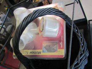 lot 457 image: Motion activated light- wicker basket- metal file organizer