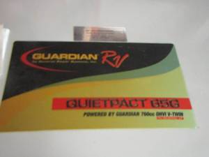 lot 2 image: RV recreational vehicle generator model # 004702-0 purchased 2004, comes with original paperwork