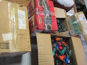 lot 527 image: 4 ft pre lite clear potted tree in original box- large qty of Christmas lights