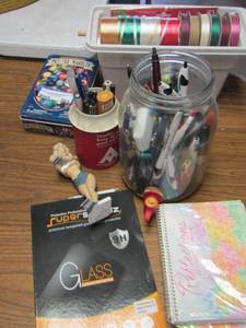 lot 565 image: Various ribbom- pens- markers- deluxe kids marbles- note pads and more