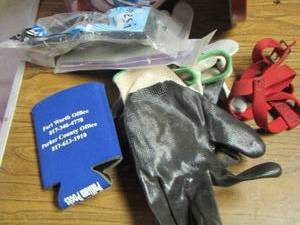 lot 567 image: Snowman tin can with misc. piping- work gloves- saftey glasses