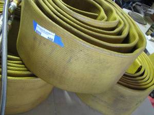 lot 568 image: Rolls of old fire truck water hose, it was purchased to used as bumper pads for there boat, qty 3 rolls