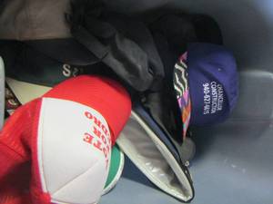 lot 573 image: tote of ball caps various ones