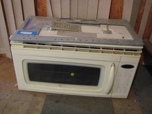 lot 29 image: Maytag over stove microwave used