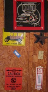 lot 599 image: The intimidator nascar flag signed- star coat rack- model T station wagon sign