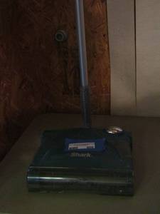 lot 606 image: Shark vacuum charging cord not included