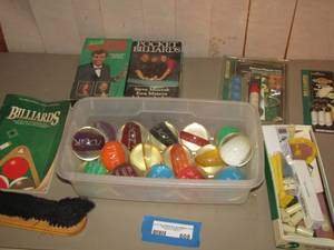 lot 608 image: Glass pool balls- VHS pool videos learn how to shoot pool- new pool stick ends