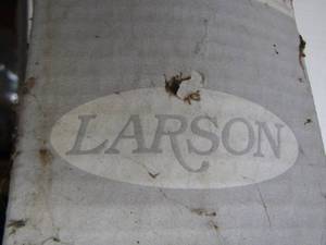 lot 24 image: Larson retractable screen for outdoor use on patio new in box