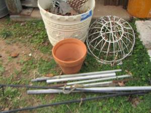 lot 644 image: Wire basket plant holders- plant pots- wind chime poles and more
