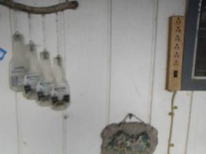 lot 651 image: Corona glass chimes- wooden butterfly outdoor wall art