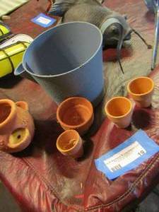lot 19 image: Blue water bucket mini planter pots