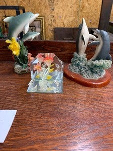 lot 32 image: Dolphin figurines