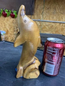 lot 56 image: Wood carved dolphin