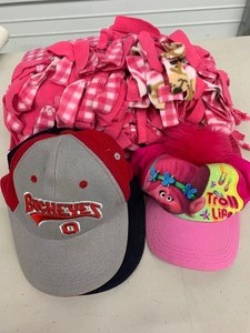 lot 58 image: Caps and a blanket