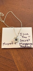 lot 8 image: Secret message necklace