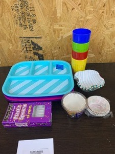 lot 142 image: Plastic ware and cupcake liners