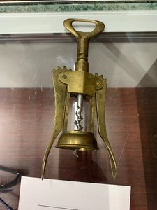 lot 167 image: Vintage brass wine cork remover