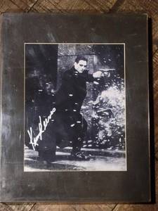 lot 2 image: Keanu Reeves Signed Matrix Photograph