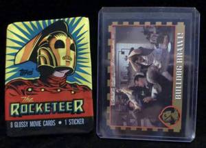 lot 245 image: The Rocketeer 8 Glossy Movie Cards and 1 Sticker with Packaging