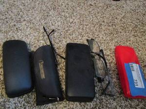 lot 731 image: eye glasses and cases qty 4 cases qty 7 pair glasses