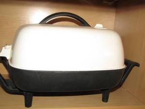 lot 765 image: covered electric cooker
