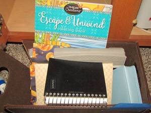 lot 768 image: notepads - small hole puncher plus
