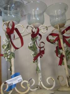 lot 775 image: 3 metal bone candle stands