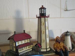 lot 784 image: light house with house various other light houses and ship captains