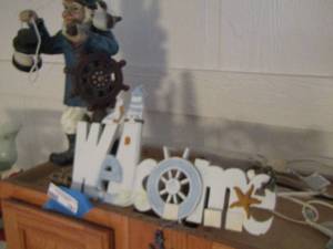 lot 781 image: welcome sign - ship captain