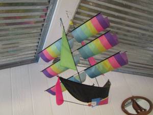 lot 707 image: Pink purple hanging sail boat