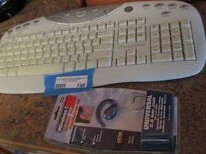 lot 798 image: Logitech keyboard ear bud new
