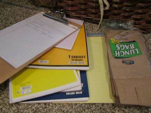 lot 819 image: clip board - spirals- note pads- lunch bags