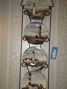 lot 837 image: plate hanger, includes 4 light house plates