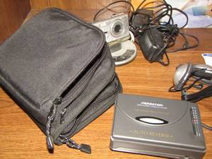 lot 852 image: Kodak camera with charger - walkman with head phones and case