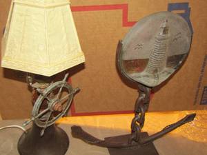 lot 878 image: man made ship wheel lamp with light house shade- man made anchor dcor with light house