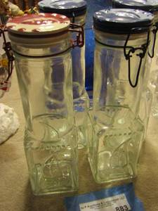 lot 883 image: glass jars with lids qty 4 all have leaf design