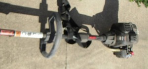 lot 904 image: 27cc speed start gas edger metal base