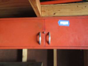 lot 925 image: small metal red storage cabinet inside holds-breaker boxes, size of cabinet 113514