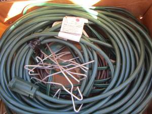 lot 934 image: Christmas light clips- extension cords