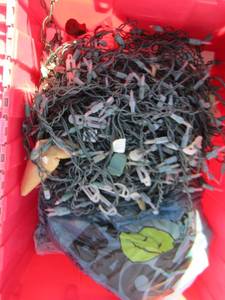 lot 938 image: red tote of Christmas lights