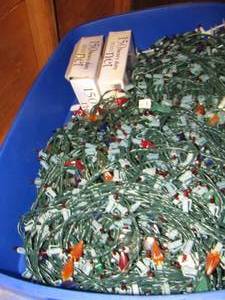 lot 944 image: blue tote of new used Christmas lights