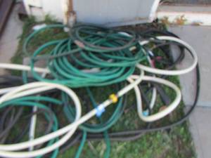 lot 975 image: large lot of water hoses